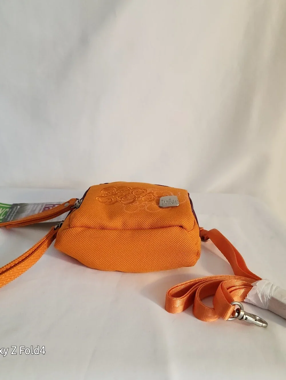 Haiku Orange Crossbody with Plum Trim and Embroidered Swirls